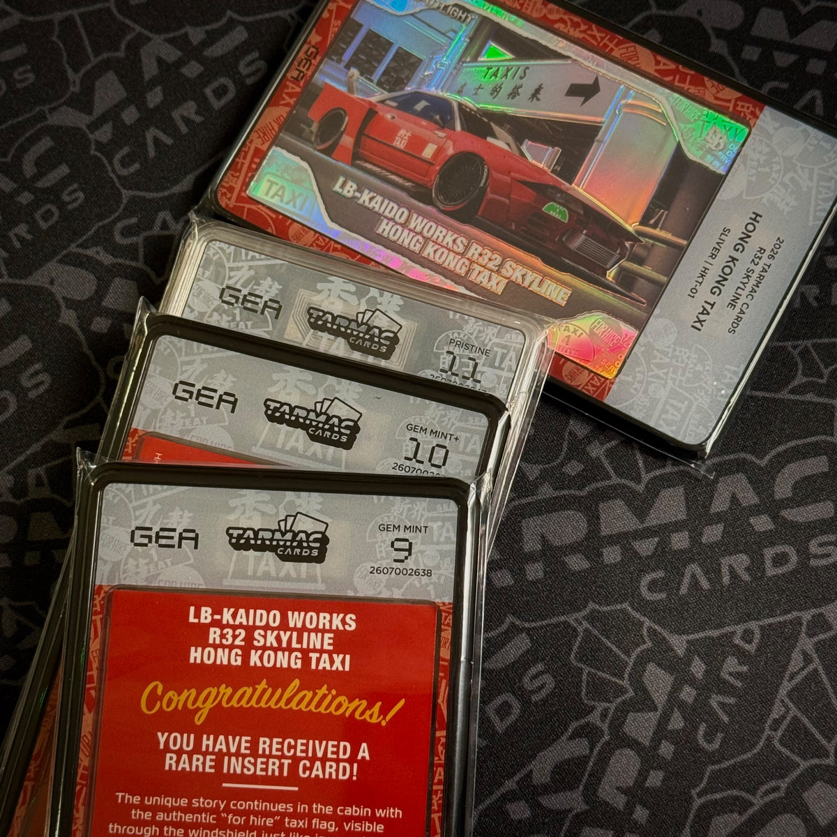 Graded Slab - Tarmac Cards Spotlight - LB-Kaido Works R32 Skyline Hong Kong Taxi - GEA x Tarmac Cards
